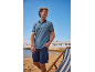 Men's polo shirt and cargo shorts on the beach, with a deckchair.