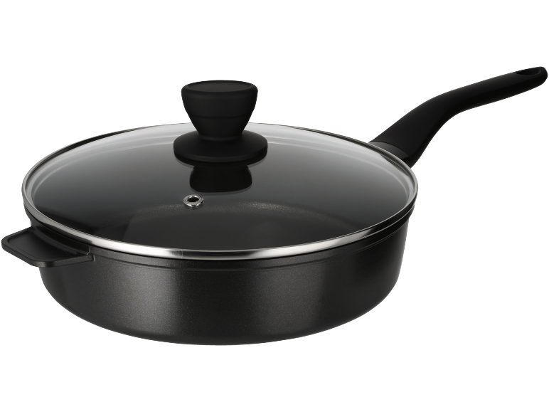 Black saucepan with a glass lid and a long handle, isolated on a black background.