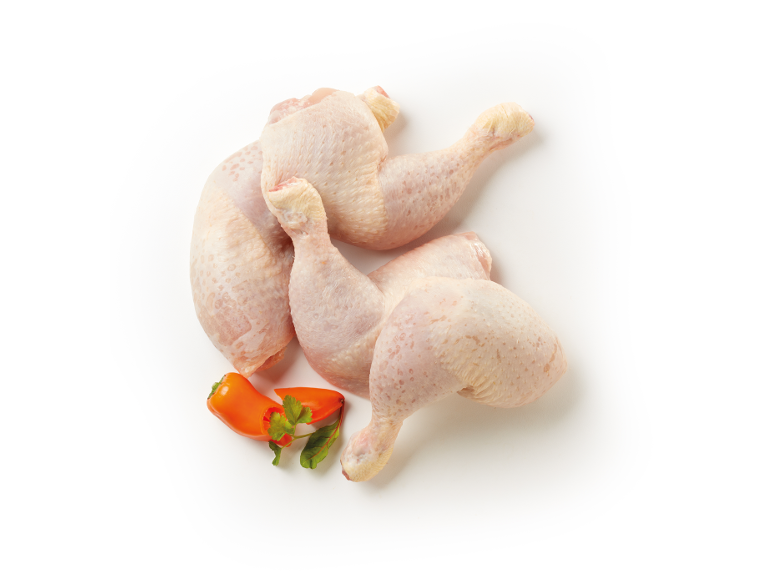 Fresh chicken drumsticks with orange pepper and parsley