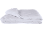 Folded white quilted duvet or comforter