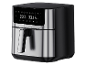 Black and silver digital air fryer with a handle and display.