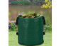 Green garden waste bag filled with leaves, with a pond in the background.