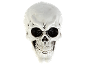 White decorative skull with black eye sockets on a black background.