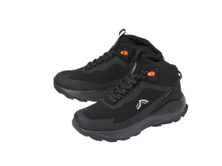 Pair of black hiking boots with orange accents and white laces.