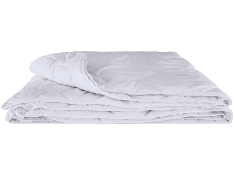 Folded white quilted duvet