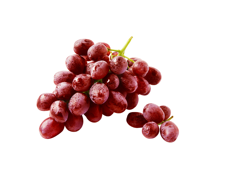 Fresh red grapes with water droplets on a black background