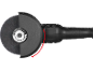 A black angle grinder with a cutting disc and a red arrow indicating movement.