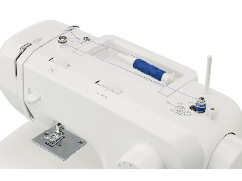 White sewing machine with blue thread and bobbin, with stitch and tension controls.