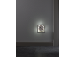 Night light with motion sensor and USB charger, plugged into a wall socket.