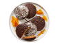 Gingerbread cookies with chocolate and powdered sugar, with orange marmalade.