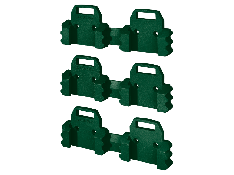 Green plastic lawn edgings arranged in three rows.