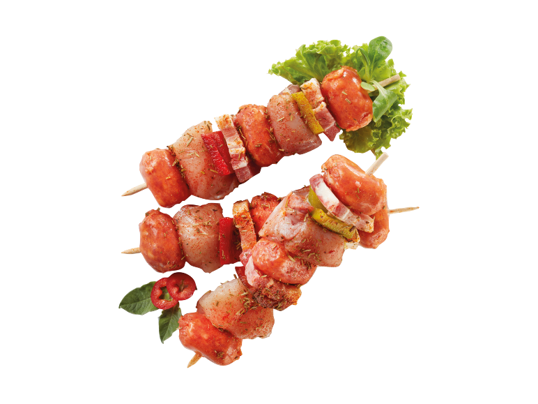 Meat and sausage skewers with fresh vegetables