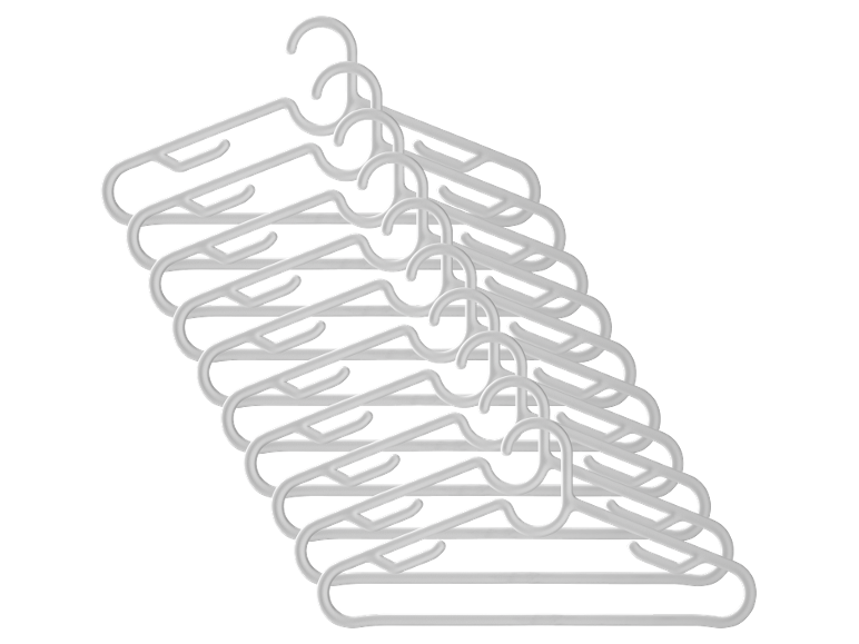 Stack of white plastic clothes hangers on a black background.
