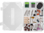 Rotary tool accessory kit in a box, including grinding stones, polishing wheels, and drill bits.