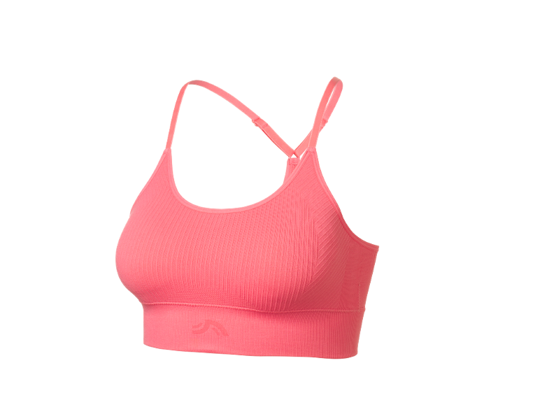 Women's pink ribbed sports top with criss-cross straps on the back.