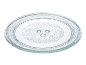 Round glass microwave plate with an embossed pattern and three protrusions.