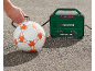 Man inflating a soccer ball with a portable air compressor.