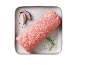 Raw ground meat roll, red onion, and rosemary on a plate.