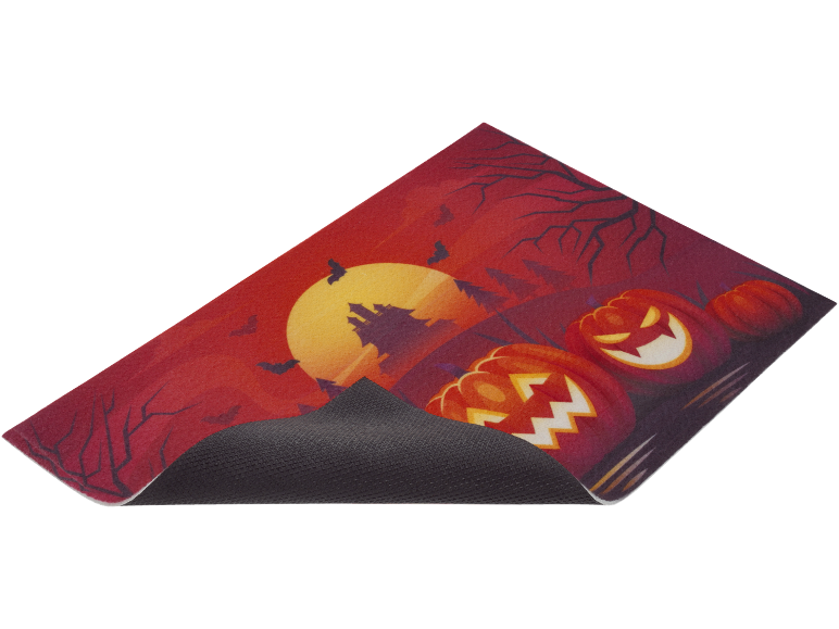 Halloween mat with pumpkins, full moon, castle, and bats.