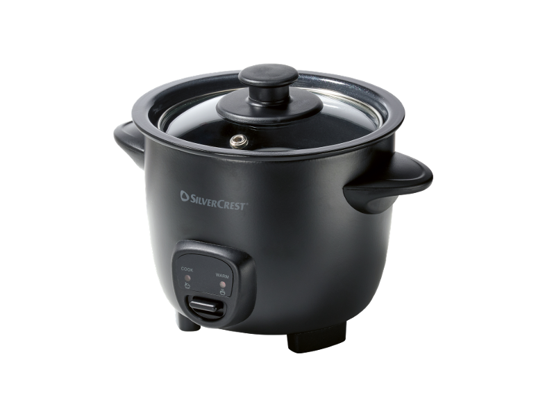 Black rice cooker with a transparent lid and a control panel with «COOK» and «WARM» buttons.