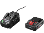 Tool charger and battery, black, with red and green accents.