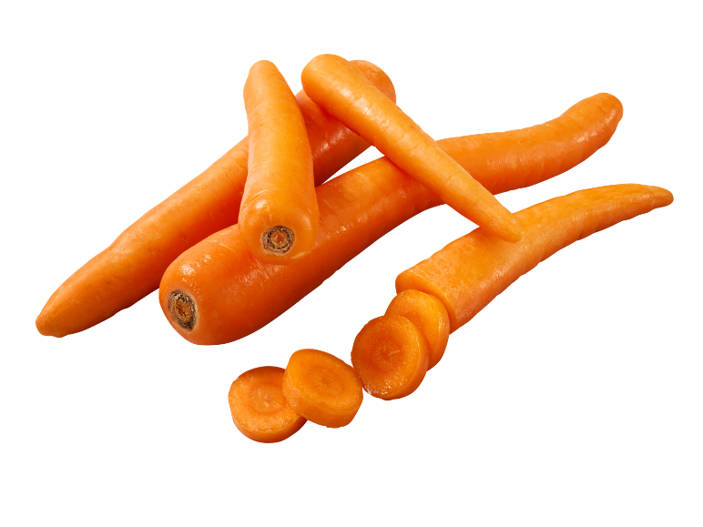 Fresh whole and sliced carrots on a black background.