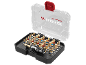 Set of golden screwdriver bits with a magnetic holder in a clear case.