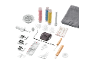 Sewing accessories kit, including colorful threads, presser feet, and needles.