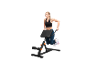 Woman exercising on an abdominal and back trainer.