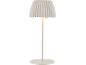 White table lamp with a pleated shade and a round base.