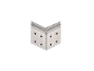 Stacked metal corner brackets with holes, against a black background.