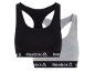 Two cotton sports bras, one black and one grey, with logo elastic band.