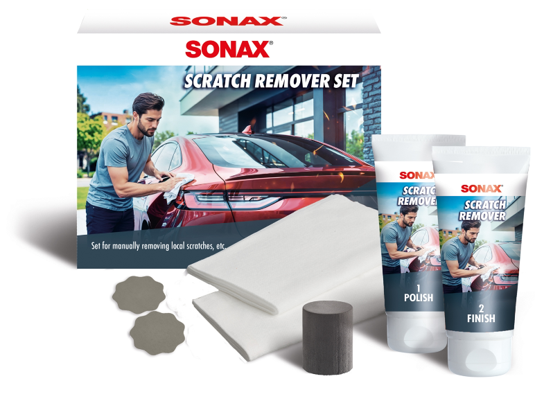Scratch remover set with two tubes of polish, cloths, and applicators, featuring a man cleaning a car.