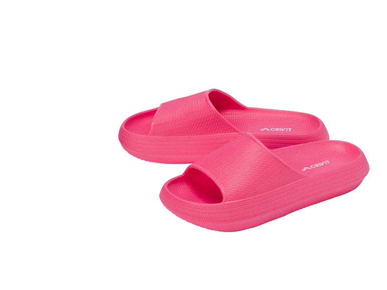 A pair of pink slide sandals with a thick sole and textured strap.