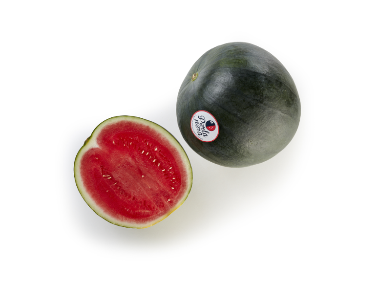 Whole and halved watermelon with bright red flesh and black seeds.