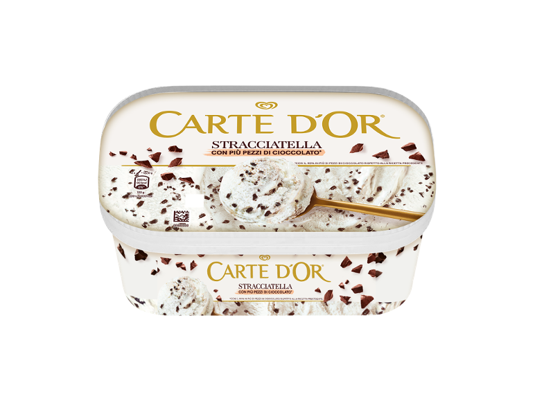 White ice cream tub with stracciatella ice cream and chocolate pieces, with a spoon inside.