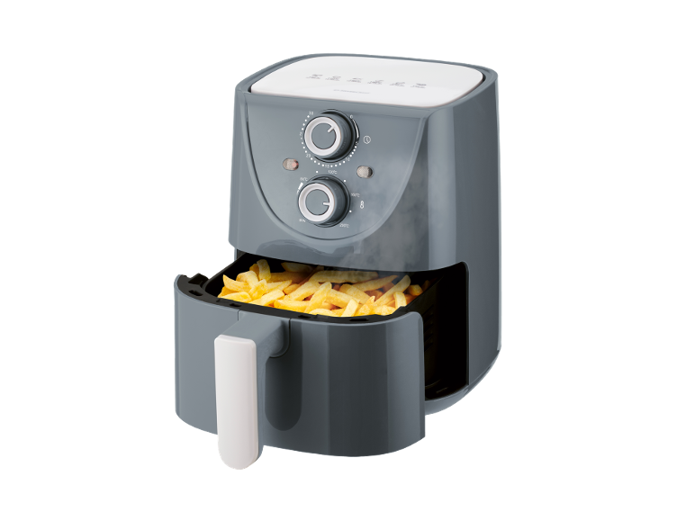 Grey air fryer with a basket full of golden french fries, showing temperature and timer dials.