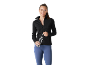 Woman in black sports jacket and blue leggings holding a water bottle.