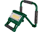Green work light with a handle and a yellow light field
