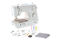White sewing machine with fabric and various sewing accessories.