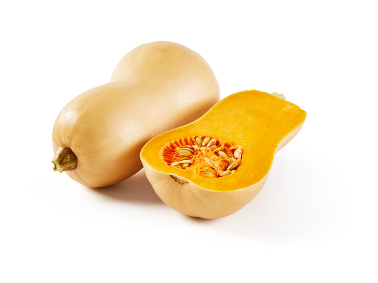Whole and halved butternut squash with seeds