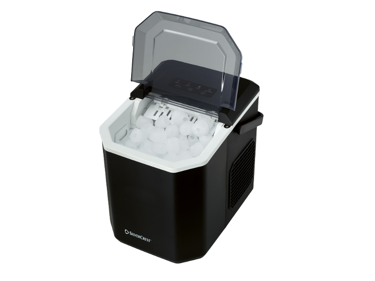 Black ice maker with an open lid, full of ice cubes.