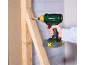 Cordless impact driver screwing a screw into a wooden construction.