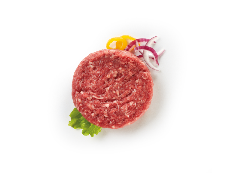 Raw meat patty with lettuce, red onion, and yellow pepper.