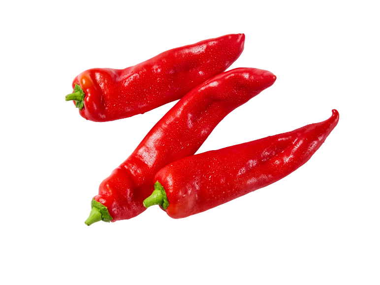 Three red pointed peppers with water droplets on a black background.