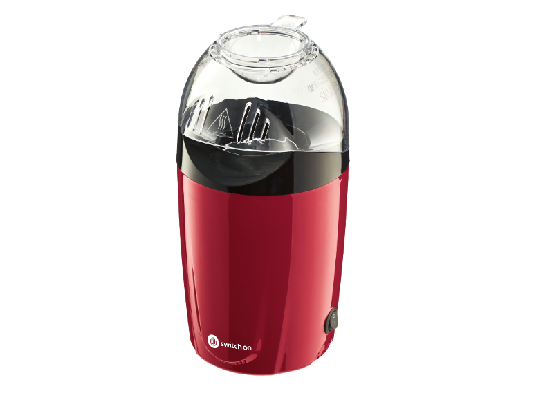 Red popcorn maker with a clear lid and the text «switch on».