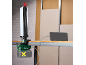 Work light with battery and charging function for a smartphone on a construction site.