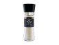 Coarse salt in a glass grinder with a black lid, labeled 