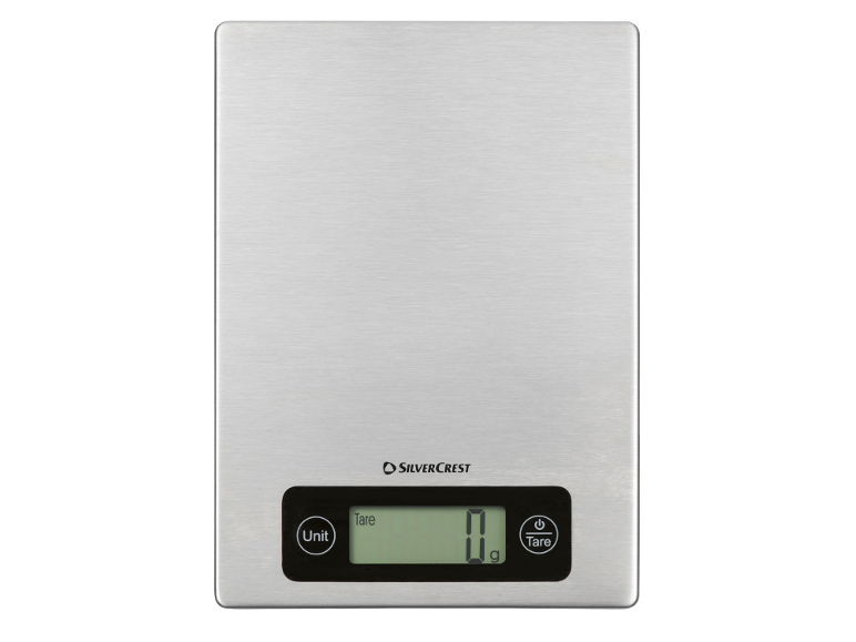 Stainless steel kitchen scale with a digital display showing «0 g» and «Unit» and «Tare» buttons.