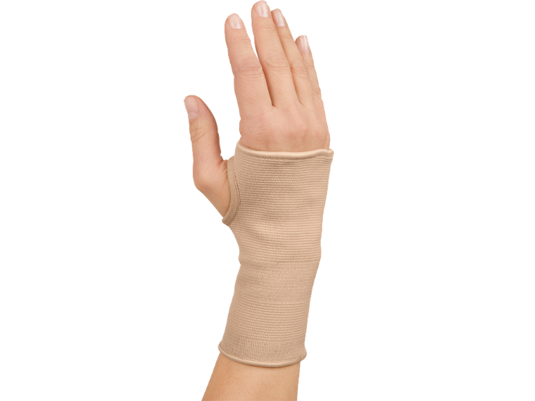 Beige compression wrist support on a hand